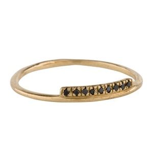 14K Yellow Gold size 5 ring, featuring 0.009 carats of round black diamonds